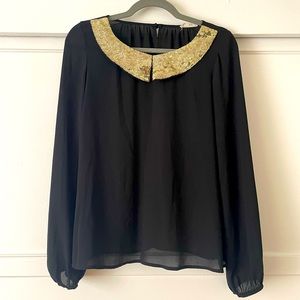 Black dressy blouse with gold sequined collar